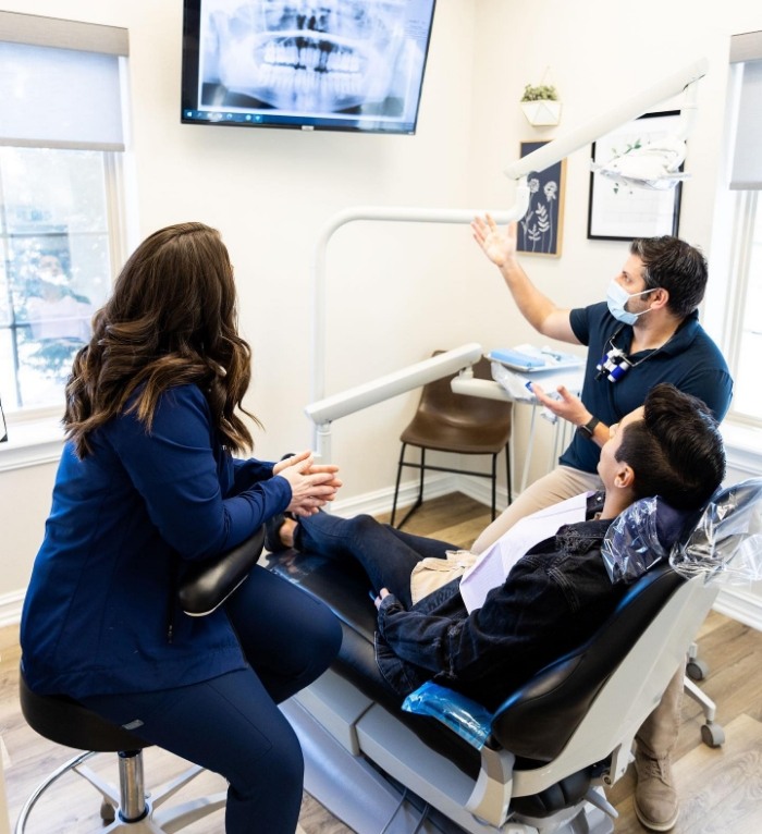 Emergency dentist in Jenks showing a patient their dental x rays