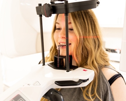 Woman getting dental scan taken