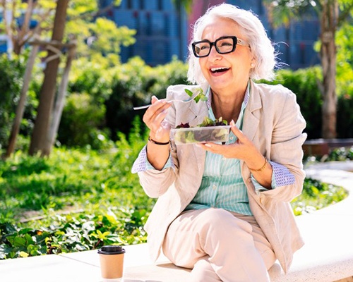 Lady eats salad