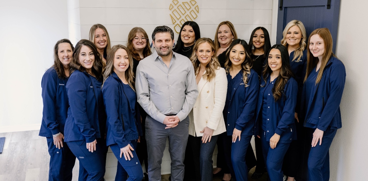 Elwood Avenue Dental team smiling in Jenks dental office