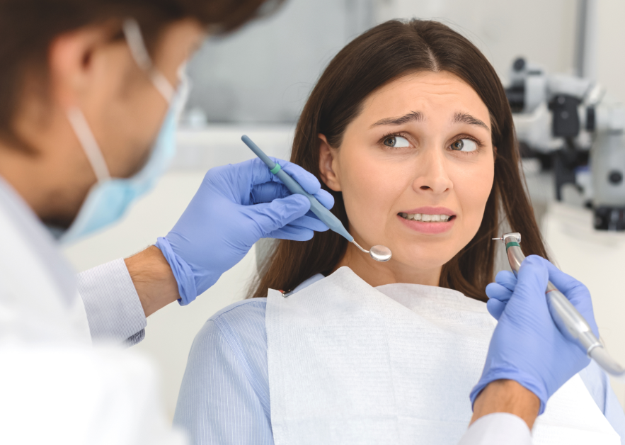 Woman looking nervous at dentist